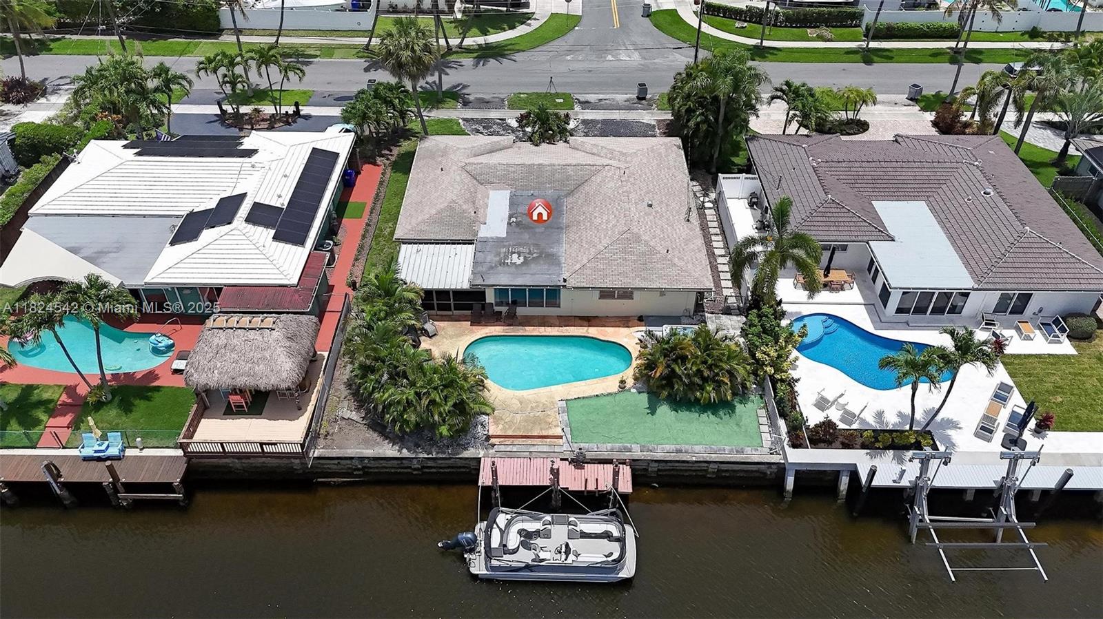 COURT ORDERED SALE -- Waterfront paradise with direct ocean access in sought after Garden Isles. The home features a split floor plan with 3 bedrooms, 2 bathrooms, and a screened in lanai. Updated kitchen and bathrooms. North South exposure allows lots of natural light to flow into the home. The private backyard provides a peaceful tropical setting to enjoy your heated pool and hot tub. **In connection with a Bankruptcy Trustee Sale. Property is sold "As-Is, Where-Is" with no representations, guarantees or warranties of any kind. Buyer's Must Do Their Own Due Diligence**