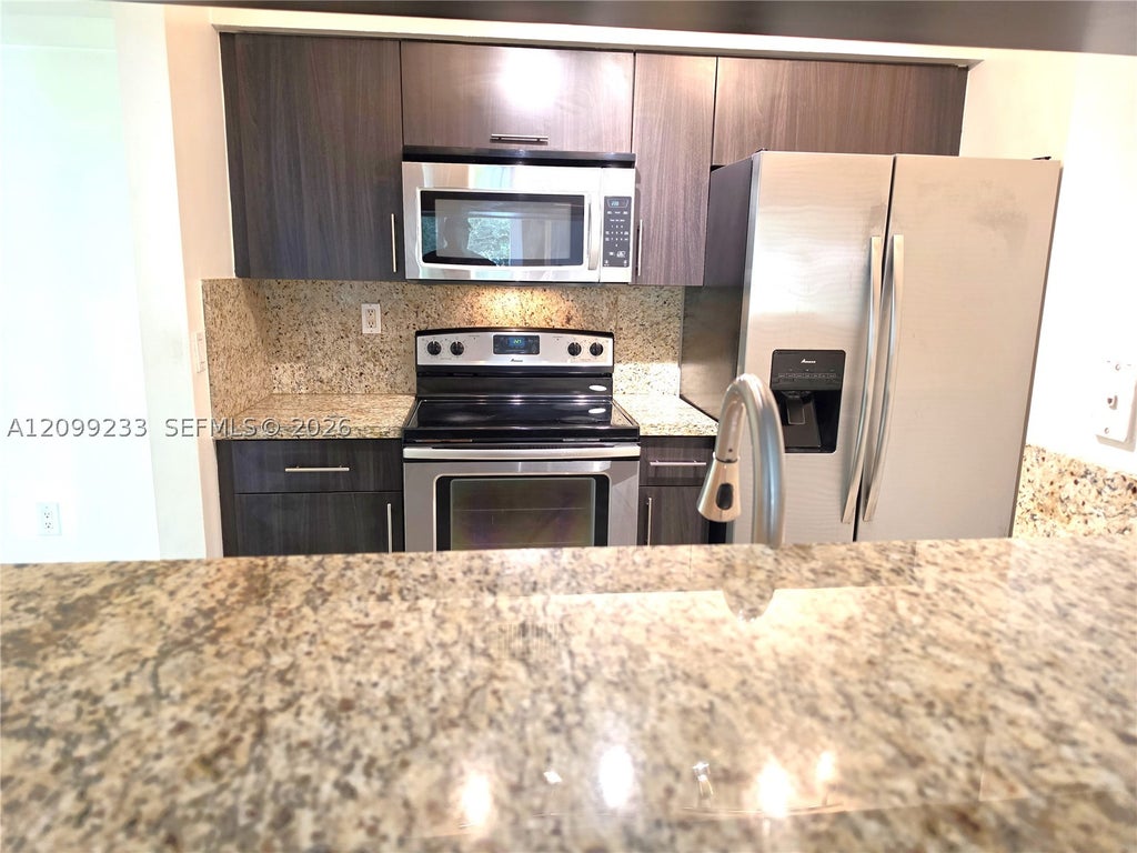 Photo of 2051 Renaissance Blvd #208, Miramar, FL 33025 (MLS # A12099233)