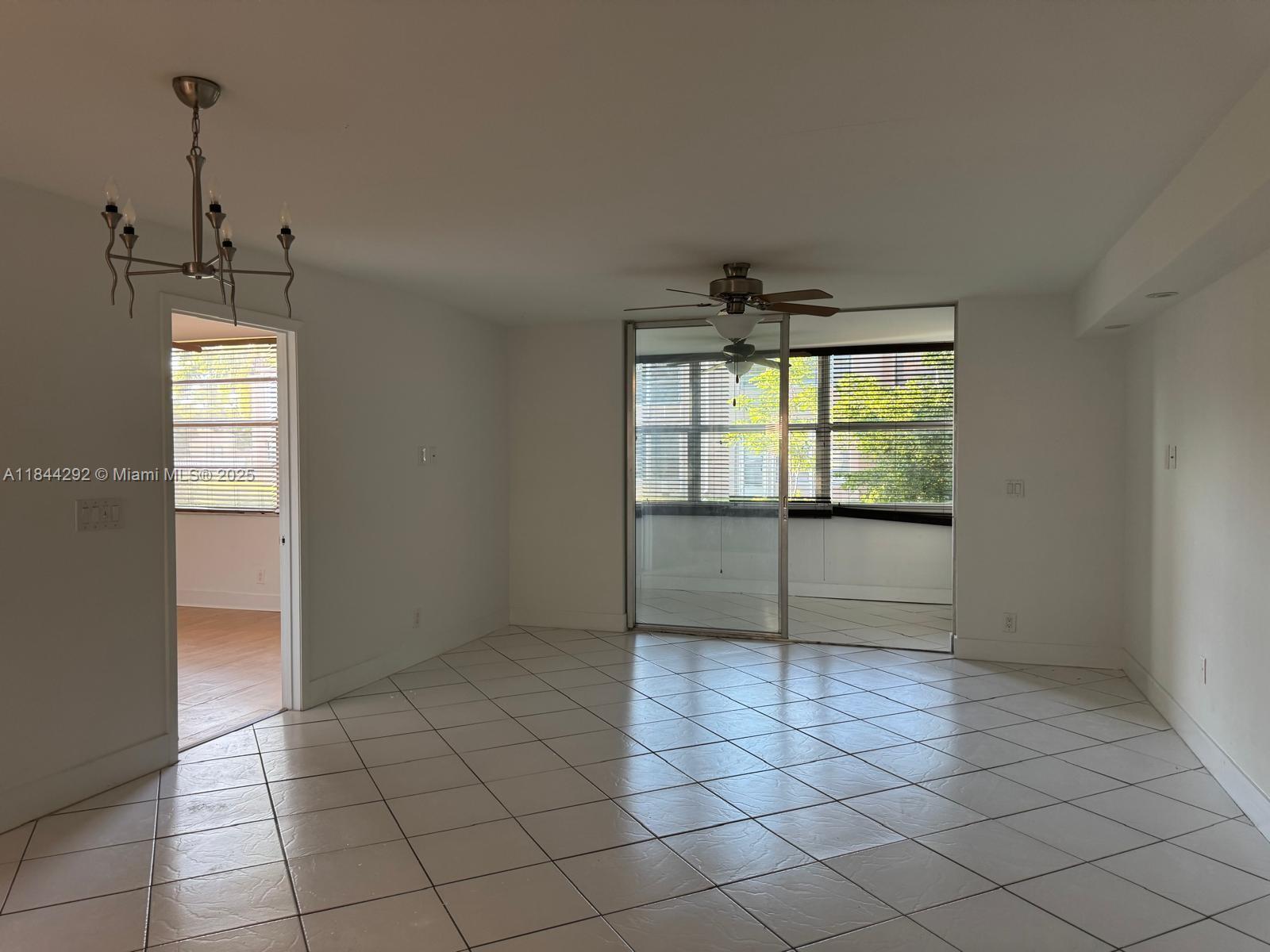 This charming property features two spacious bedrooms, two bathrooms, and a dine-in kitchen complete with a washer, dryer, and utility sink. An enclosed Florida room provides additional living space. Water is included in the rent for added convenience. The association requires applicants to have a minimum credit score of 620 and provide proof of income. Please note that pets are not permitted.