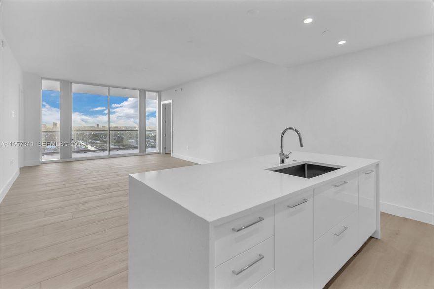 Experience elevated coastal living at Selene Oceanfront Residences with Residence 2003E, a stunning 20th-floor home offering sweeping Intracoastal and canal views paired with breathtaking sunsets and Fort Lauderdale’s skyline. Ideally located directly across from award-winning Las Olas Beach and just minutes from the boutiques, cafés, and fine dining of Las Olas Boulevard, this residence delivers an unmatched beachfront lifestyle.

Residence 2003E features soaring floor-to-ceiling windows, and a light-filled open layout designed for elegant coastal living. Expansive living areas flow seamlessly to a private terrace with glass railings, creating the perfect setting for indoor-outdoor entertaining while enjoying panoramic water and city views.

Selene offers a world-class, resort-style amenity collection including an elevated beachfront amenity deck with resort pool, lap pool, spa, cabanas, fire pits, and poolside bar; a state-of-the-art fitness center; theater; refined social lounges; business center; dog park; and oceanfront dining. Residents enjoy 24/7 staffed front desk, concierge services, valet, secured parking, and on-site management. A rare opportunity to own a premier 20th-floor residence in Fort Lauderdale’s only new luxury beachfront landmark.