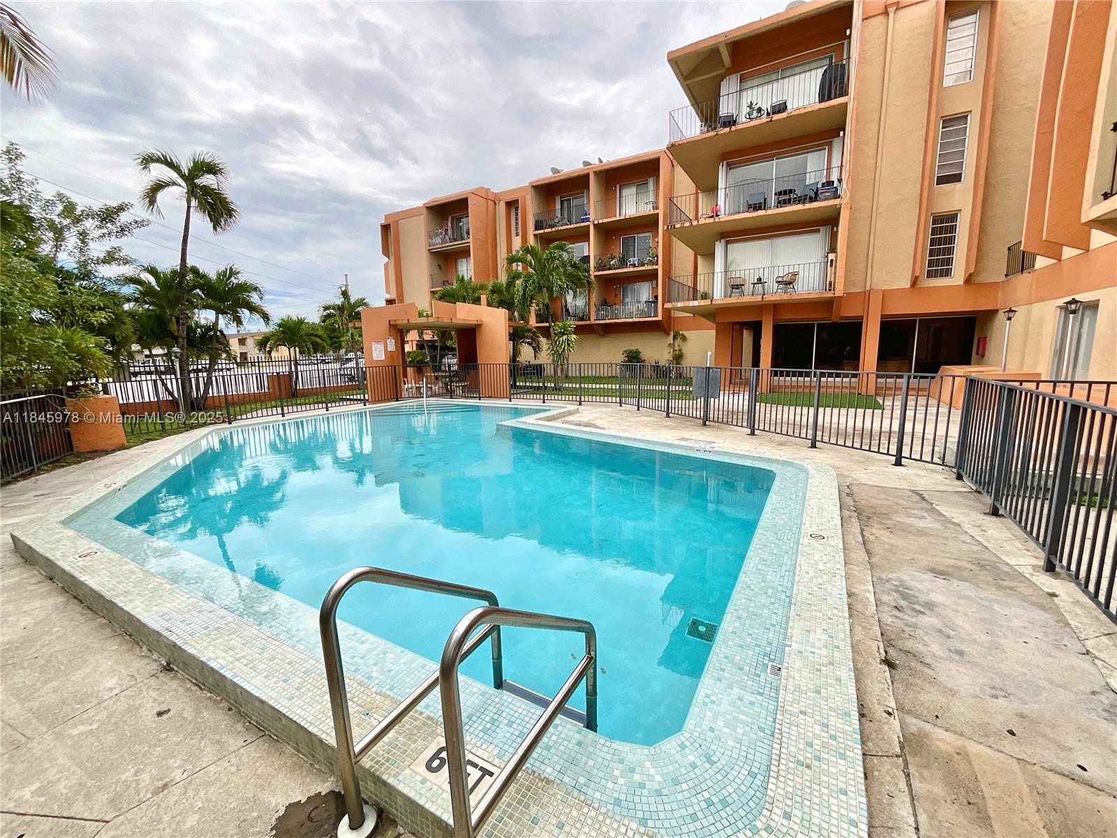 Best value in Hialeah!!! Spacious 2-bedroom, 1.5-bath unit with over 930 sq ft of living space, including a private open air balcony. Enjoy an open living area filled with natural light and a functional kitchen with ample cabinet space—ideal for cooking and entertaining. The neighboring unit sold for nearly \$230,000, making this a smart buy. Located in a well-maintained building with elevators, a community pool, and laundry facilities on every floor. Assigned covered parking included! Prime location within walking distance to shops, restaurants, Amelia Earhart Park, and more. Whether you're a first-time buyer or investor, this is the opportunity you’ve been waiting for. Ok to lease on the first year which makes this a great money producing investment. Don’t miss out—call today!