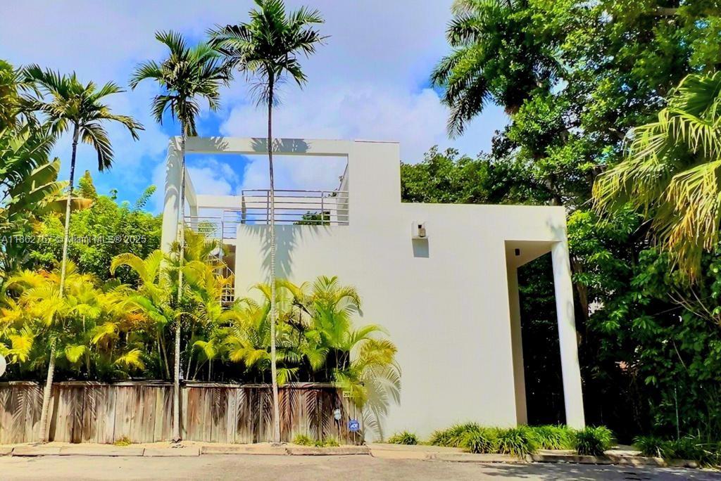 A FULLY FURNISHED masterfully Designed 3 Bedroom Townhome in the Heart of Coconut Grove. 3 bedroom, 2 1/2 bath townhome. This unique 2 Level Townhome offers privacy and security in the Grove along with a comfortable layout including a lushly landscaped private courtyard. Minutes away from the new CocoWalk. With world-renowned restaurants, nightlife and boutique shops. Conveniently and centrally located to Brickell, Downtown, Wynwood, Coral Gables, and Pinecrest. Great opportunity for children with so many specialized private and Montessori schools as well as A-rated public schools. Fully furnished at $6900/month annual lease OR $7900/month for 6 months. See Brokers Remarks for showing access.