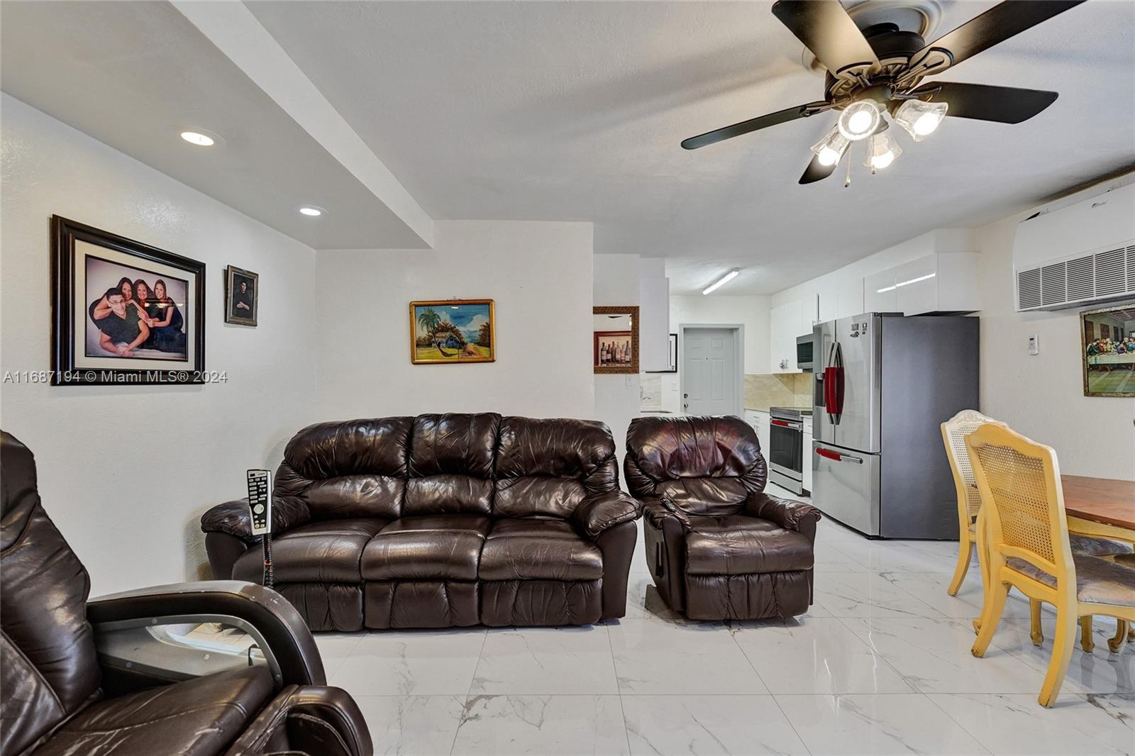 Excellent investment opportunity in Hollywood, FL! This beautifully updated 2-bedroom, 2-bathroom home features a modern open floor plan with a stylish kitchen with granite countertops and wood cabinetry. The home boasts elegant porcelain floors in the living area, and both bathrooms are tastefully updated. Enjoy a spacious, fenced yard and a bonus room, offering versatility and added value. Located just minutes from the beach, I-95, shopping, dining, and entertainment, this property is perfect for generating a steady income. Don’t miss out on this prime investment!