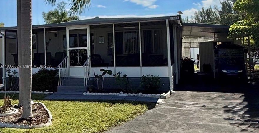 OWN the land! This charming 2 bedroom 2 bathroom fully furnished doublewide manufactured home features a very low HOA fee. Perfect for full time or part time living.  Located in the highly desirable Estates of Fort Lauderdale community.  Only 4 miles from Beaches, Dania Point Shopping, Hard Rock Casino, easy Freeway access and close to Airports.
Home features include; New patio door, Newer Stainless Steel Appliances, new lighting fixtures throughout with fans, updated bathrooms, driveway re-surfaced 2024, Open Floor plan, planted raised Garden, outdoor. new sealant on roof completed March 2025.
Extremely low HOA $115. Amenities; Clubhouse, Olympic size Swimming Pool, Fitness Center, Sauna, Pickleball, Petanque courts, Hair Salon, Shuffleboard & Clubs with Activities. No rental 1st 3yrs.