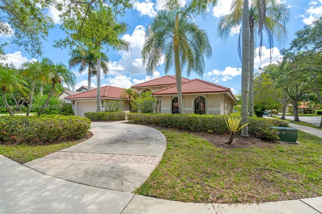 Photo of 1051 Deerpath Ct, Weston, FL 33326 (MLS # A12021378)