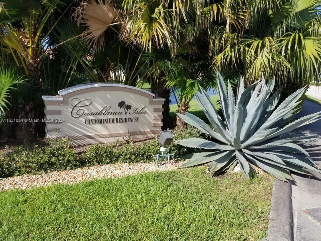 Photo of 815 W Boynton Beach Blvd #201-7, Boynton Beach, FL 33426 (MLS # A11631054)