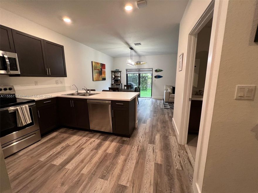Beautiful and spacious Townhouse in Davie, 3 bedroom and 2/1 bathroom  This large 1,696 Sq Ft was
constructed in 2020,Hurry this area sells fast. The unit feature  stainless steel appliances, (refrigerator Stove, dish washer) Washer and dryer and Water purifier system, bath on lower level. Very low HOA (250/month)