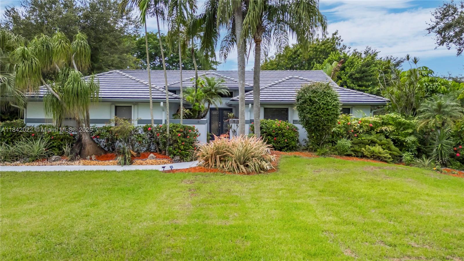 Beautiful 4-bed, 2.5-bath estate home in the highly sought-after equestrian community of Majestic Grove in Davie. This spacious home features a 2-car garage, lush landscape and mature trees, private pool, serene pond, and stunning lake views. Recent updates include a 2020 roof, 2022 AC, 2024 septic system, and 2024 impact front door. Enjoy peace of mind with accordion shutters throughout. Located in a peaceful, upscale neighborhood known for its large lots and equestrian lifestyle. Don't miss this rare opportunity to own in one of Davie’s most desirable communities. Perfect for entertaining, relaxing, or enjoying the natural surroundings. A must-see!