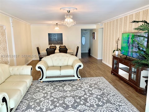 Photo of 619 NE 14th Ave #301, Hallandale Beach, FL 33009 (MLS # A12053857)