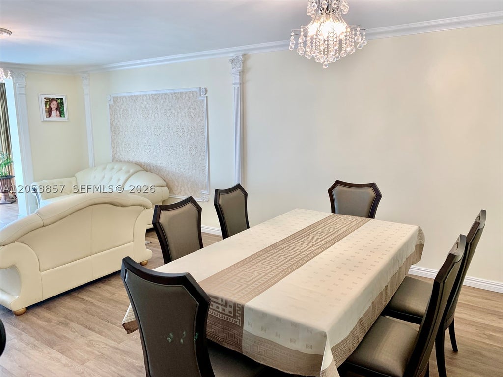 Photo of 619 NE 14th Ave #301, Hallandale Beach, FL 33009 (MLS # A12053857)