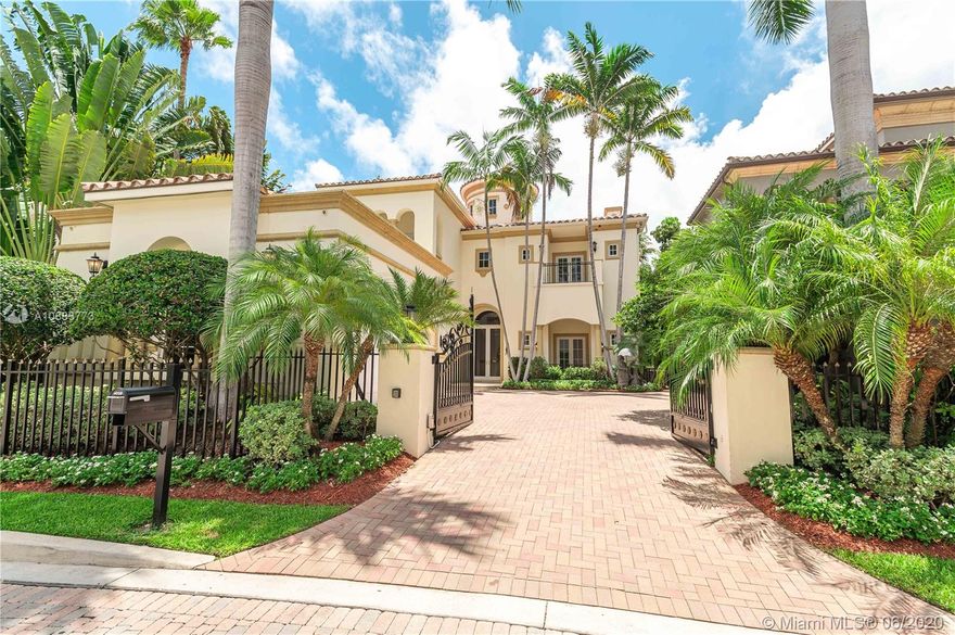 Island Estates-Modern Mansion has 6 Bds, 6.5 Bths 6200+ SQFT,PLUS a 3 car garage, soaring ceilings & vast balconies bringing the home to 7200 SQFT! INCLUDES A 50' ASSIGNED yacht slip!Great for entertaining w/ the formal bar/wine area, vaulted ceilings, wood floors throughout,coiffured ceilings,custom built-ins & open floor plan. Two first floor guest rms w/ full bathrms, LG formal dining rm w/ a custom atrium & fountain, formal living rm, wood burning fire place, separate den, chef's gourmet eat-in kitchen, cabana bath & full laundry facilities on both floors. The grand staircase or elevator will take you to the 2nd fl w/ 2 XL guest bedrms & bathrooms & the vast mstr bedrm & bathrm, custom walk-in closets,HUGE balcony & calming water views. Come experience the home!