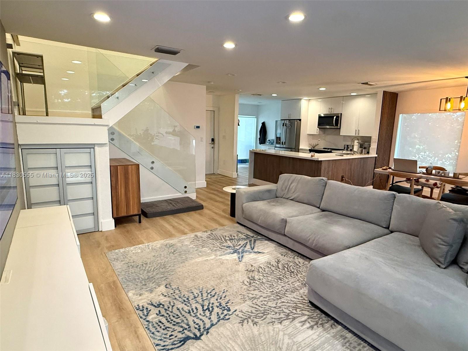 Live in Doral Isles, one of the most prestigious and sought-after communities in Doral, known for its lush green landscapes, expansive lakes, and world-class amenities. This beautifully remodeled townhouse offers 3 bedrooms and 2.5 bathrooms, featuring a modern kitchen with quartz countertops, stainless steel appliances, and stylish cabinetry. Enjoy elegant vinyl floors, and abundant natural light throughout. The private fenced patio is perfect for relaxing or entertaining with its summer kitchen. Residents enjoy 24/7 security, resort-style pools, a clubhouse, fitness center, sports courts, and scenic walking trails. Located near top-rated schools, shopping, dining, and major highways. A rare opportunity to rent in a true resort-style setting—available now!