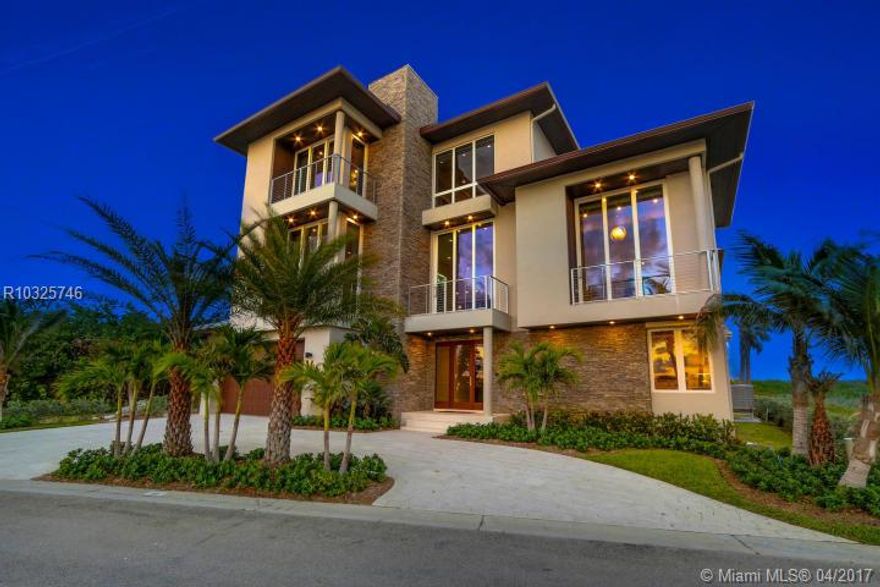 Enter the gates of Diamond Sands where this 4 bedroom 4.5 bath + office oceanfront home awaits. You will be captivated by the PANORAMIC East to West Views of the Ocean & the Indian River Lagoon which makes this address a place of prominence & seclusion. Once inside you will experience this magnificent Classic decor meets modern design, accompanied by all you desire. Fully Furnished with Designer touches , Floating Staircase with glass Railings & 6 Seat Cinema Room with Audio system & Projector Screen, cust