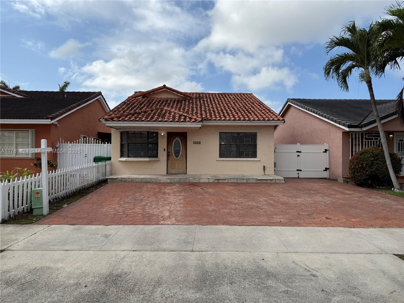 9058 Nw 115th St, Hialeah Gardens, Miami-Dade County, Florida - 4 Bedrooms  
2 Bathrooms - 