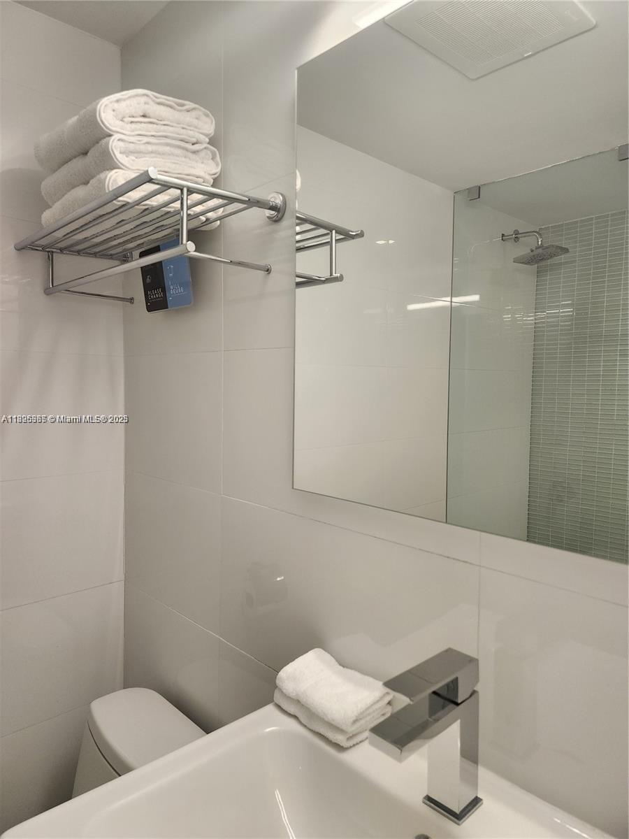 6080 COLLINS CONDO - Residential