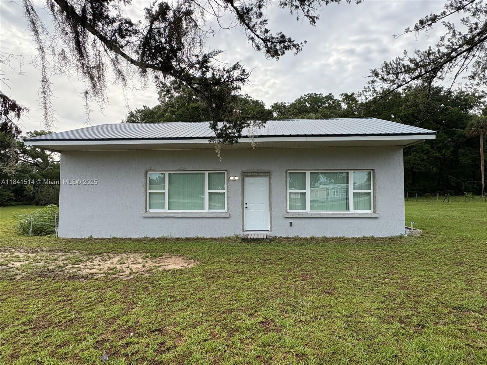 Welcome home to serenity and comfort, this charming home in Citra, Fl is set along a quiet stretch of Ne Jacksonville Rd. This delightful home offers a perfect blend of rural charm and modern convenience with a fresh and complete remodel. Enjoy convenient access to Gainesville, friendly small town community, and nearby nature and recreation. It has a bright and functional layout, well equipped kitchen, and generous bedrooms.