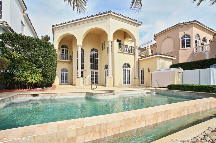 This Exclusive and guard-gated ISLAND ESTATES home, has an extremely rare 110 Foot Dock, w/Ocean Access!! DOCK YOUR YACHT across from your home! This 5,594 SqFt Mediterranean home has Inter-coastal views from both the front and back.  Beautiful marble floors and stunning marble staircase. Features 5 bedrooms 6 full baths and 1 half-bath. Opulent Master suite, workout room, elevator, Impact glass. RARE 110 FOOT DOCK, IDEAL LARGE VESSEL OWNERS!