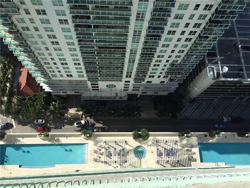 Vacant & very easy to show. NO PETS. NO EXCEPTIONS. 1/1 unit with both city and partial bay views from the 37th floor has carpet in common areas & tile in the bathroom/kitchen. Rent INCLUDES water, basic cable, basic internet. Great opportunity for a tena nt to just pay rent and FPL! Fast approval process, close to Metrorail, nghtlife and downtown. Full service bldg includes gym, two pools, hot tub and a front desk with security. One assigned parking space. Won't last! Among the lowest priced rentals!
