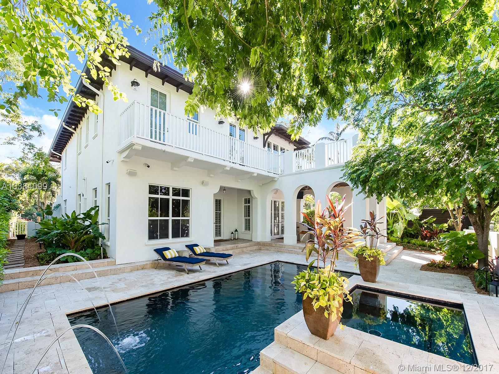 Stunning 2-level gated Smart Home custom designed with chic interiors that seamlessly flow outdoors to a lusciously-landscaped pool deck with salt-water pool/jacuzzi/water feature & covered patio with direct access to Merrie Christmas Park in prestigious South Coconut Grove. Main level boasts French Limestone flooring, formal living room, grand family room, Chef's kitchen with island, eat-in bar, Viking/Miele/SubZero gas appliances & breakfast room, formal dining room, powder room, 1 bed/ensuite bath & laundry room. Glass-enclosed staircase with real hardwood leads to 2nd level with 2 beds/ensuite baths, bonus room & Master Suite with large walk-in closet, office, terrace & spa-like bathroom with rain shower, jacuzzi, dual vanity & seating area. Lutron LED's, security cameras & generator.
