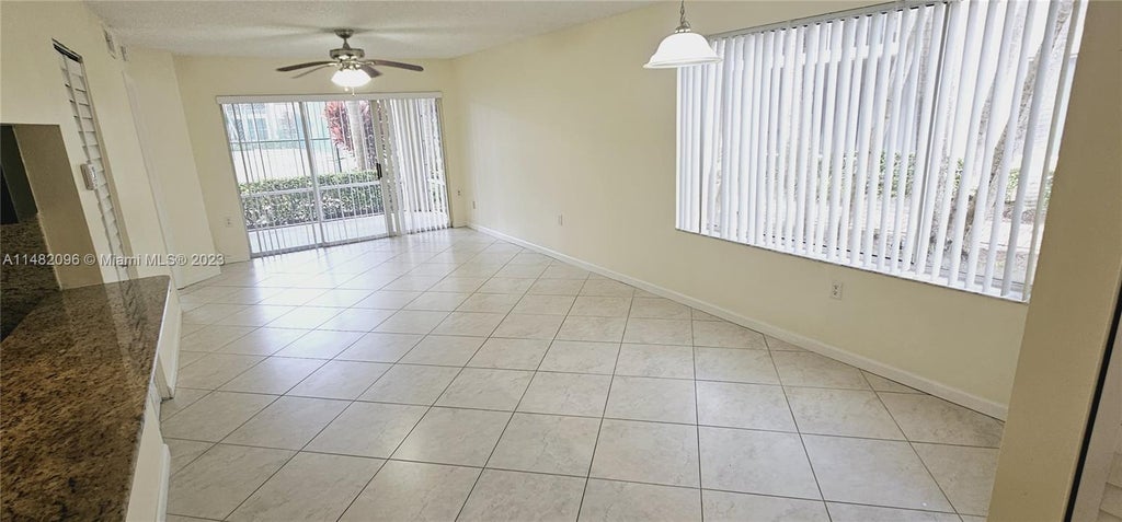 Photo of 1707 Village Blvd #208, West Palm Beach, FL 33409 (MLS # A11482096)