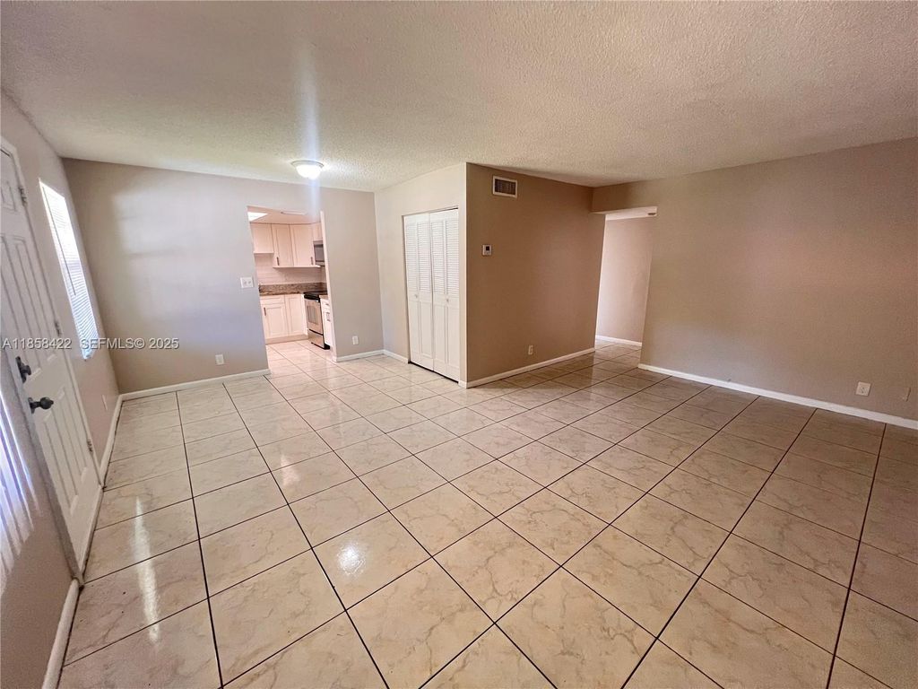 Photo of 1200 SW 50th Ave #209-3, North Lauderdale, FL 33068 (MLS # A11858422)