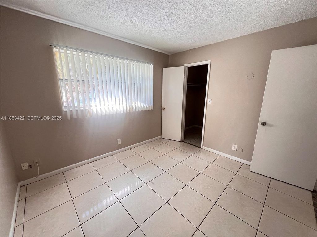 Photo of 1200 SW 50th Ave #209-3, North Lauderdale, FL 33068 (MLS # A11858422)
