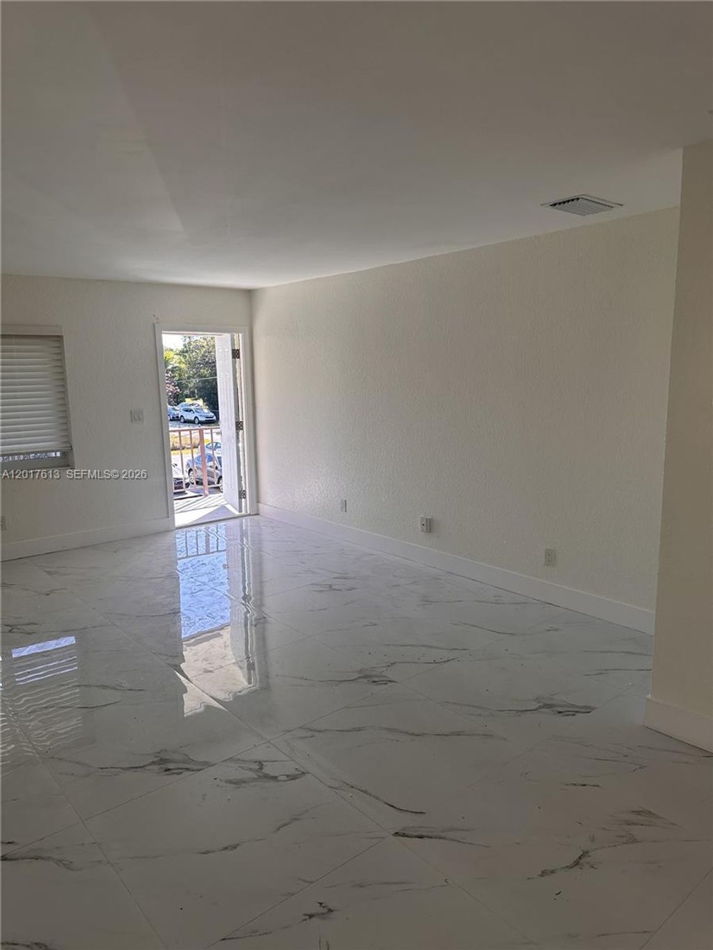 Photo of 6591 SW 46th St #1, Davie, FL 33314 (MLS # A12017613)