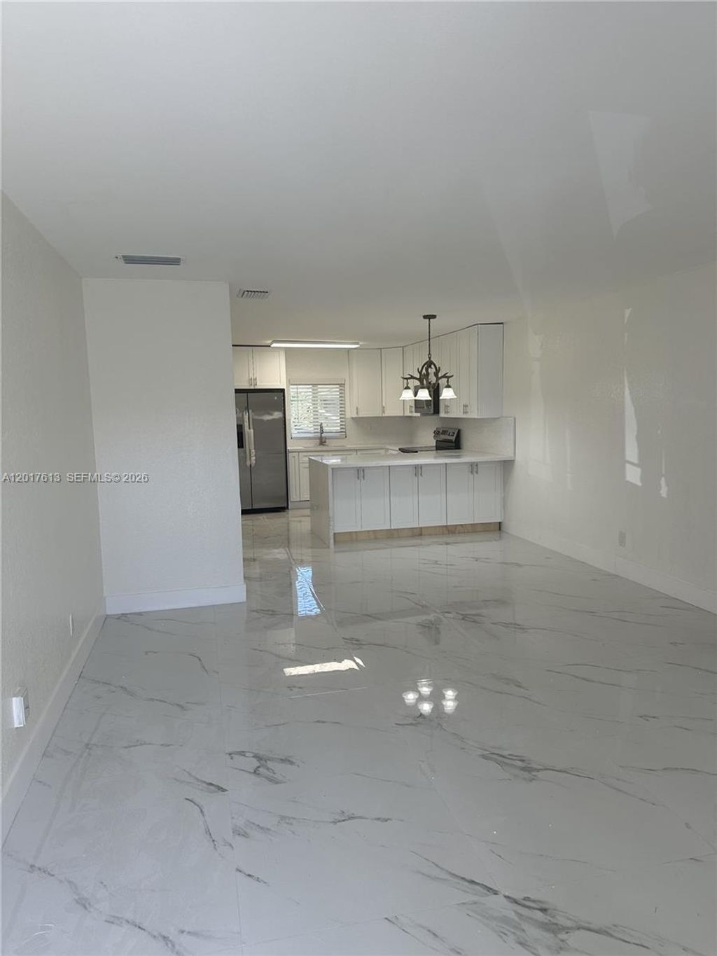 Photo of 6591 SW 46th St #1, Davie, FL 33314 (MLS # A12017613)