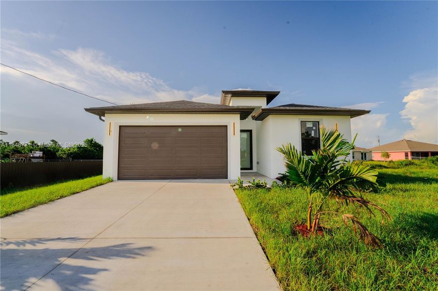 Don’t miss this brand-new construction home located just minutes from Fort Myers in the growing Lehigh Acres community. This beautifully designed residence features 3 spacious bedrooms, 2 full baths, and an open-concept layout filled with natural light.  Enjoy a large modern kitchen complete with stainless steel appliances, quartz countertops, and ample cabinetry—perfect for both daily living and entertaining. Additional highlights include a two-car garage, a private enclosed lanai, and quality finishes throughout.  Whether you're a first-time homebuyer, a growing family, or an investor, this move-in-ready home offers comfort, style, and convenience in one of Southwest Florida’s fastest-growing areas.