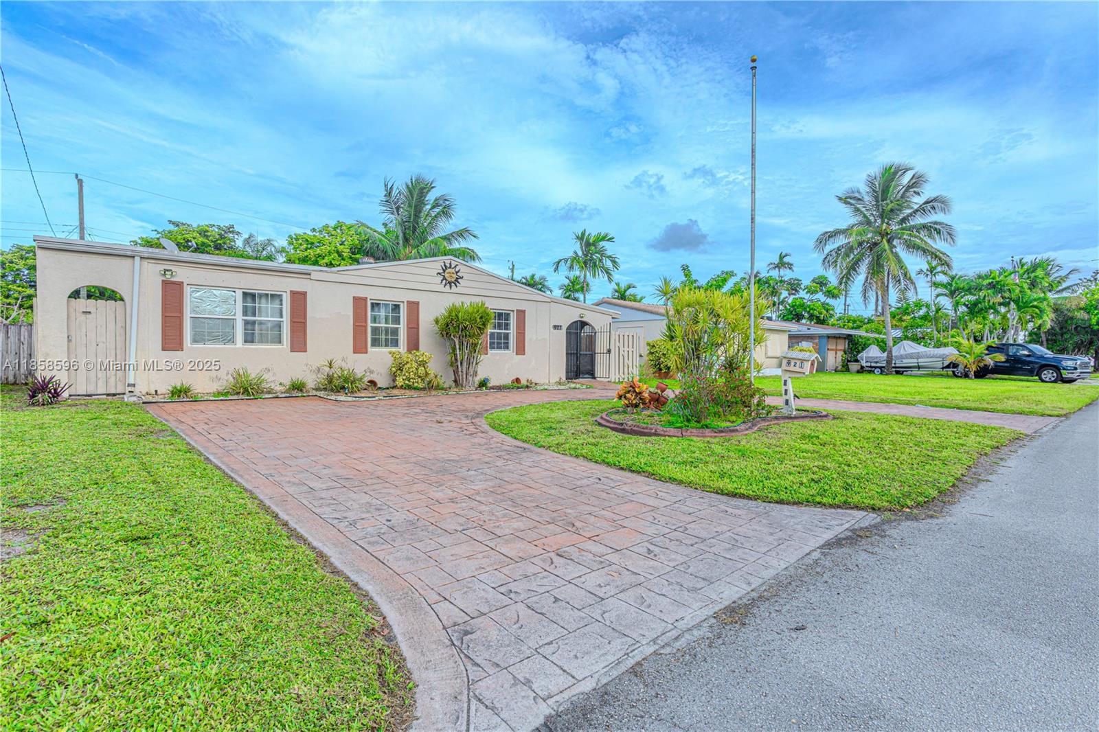 DON’T DELAY – BUY TODAY! Only 3 miles from stunning beaches, this beautifully updated 3-bedroom, 2-bath gem in Breezy Manors delivers the perfect mix of location, style, and comfort. Minutes from major shopping, the iconic Guitar Hotel, Hard Rock Stadium, and I-95, you’ll love the unbeatable convenience. Features include a circular driveway, sleek ceramic tile floors (no carpet), a designer kitchen with granite countertops, custom wood cabinetry, and stainless steel appliances. Relax in the spacious family room, work from the versatile office/4th bedroom, or entertain in your private, fenced backyard with room for a pool and space for a boat/RV (per city regulations). Recent updates: roof (2008, repaired 2023), A/C (2016), and a working jacuzzi! Stroll to parks, YMCA, and more.