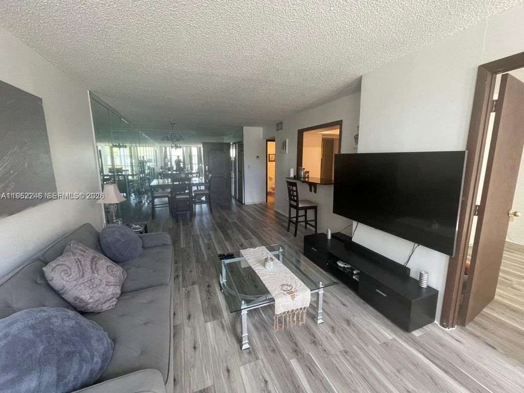 Photo of 801 Three Islands Blvd #112, Hallandale Beach, FL 33009 (MLS # A11952246)