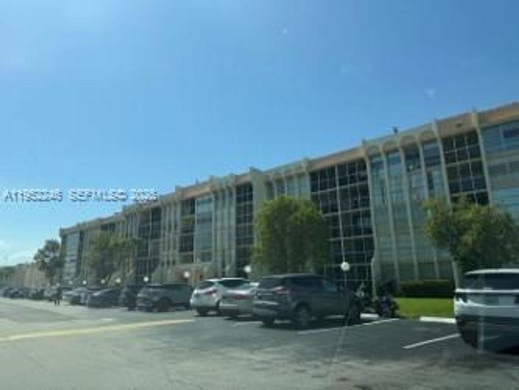 Photo of 801 Three Islands Blvd #112, Hallandale Beach, FL 33009 (MLS # A11952246)