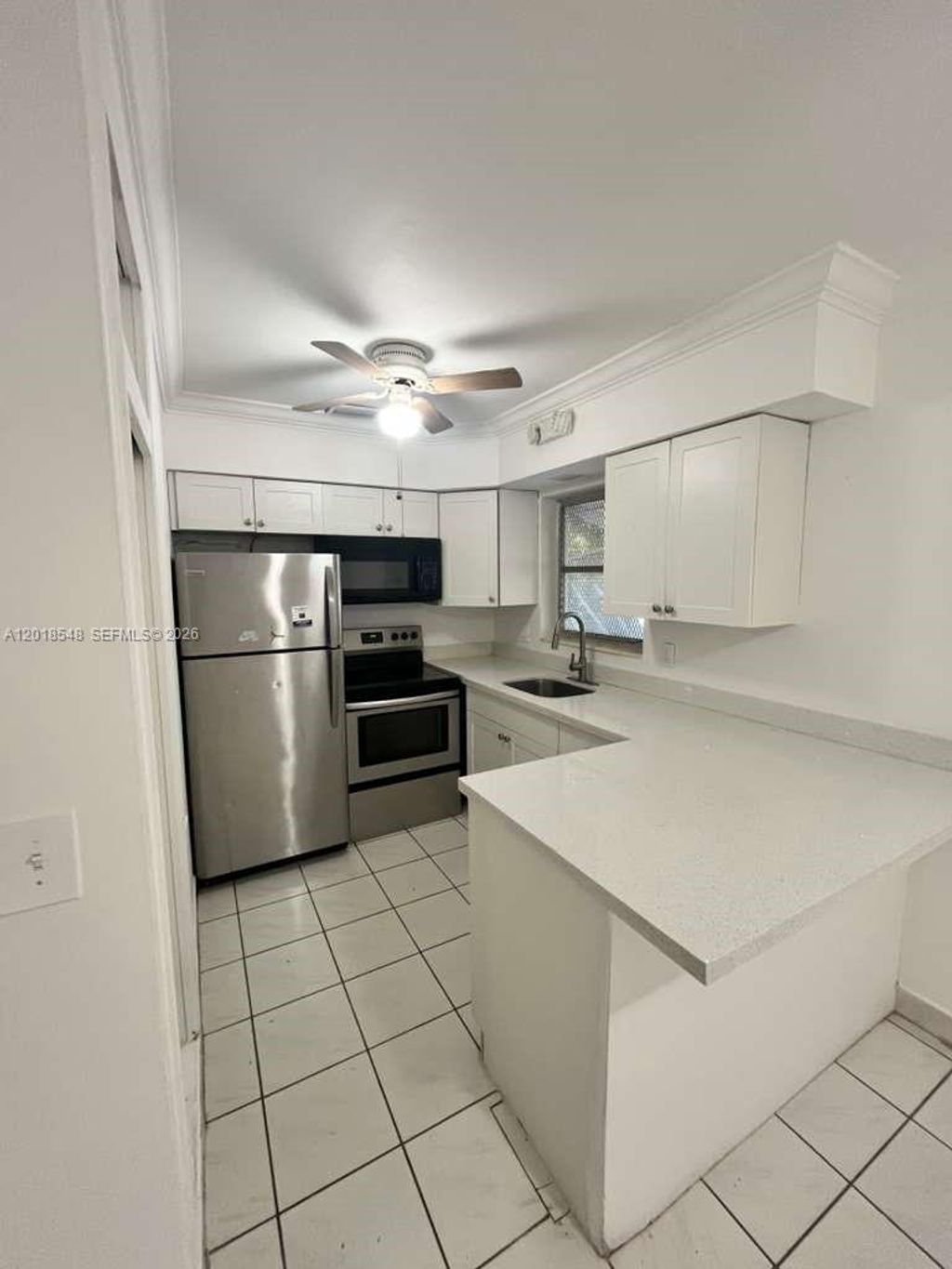 Photo of 2450 Lincoln St #7, Hollywood, FL 33020 (MLS # A12018548)