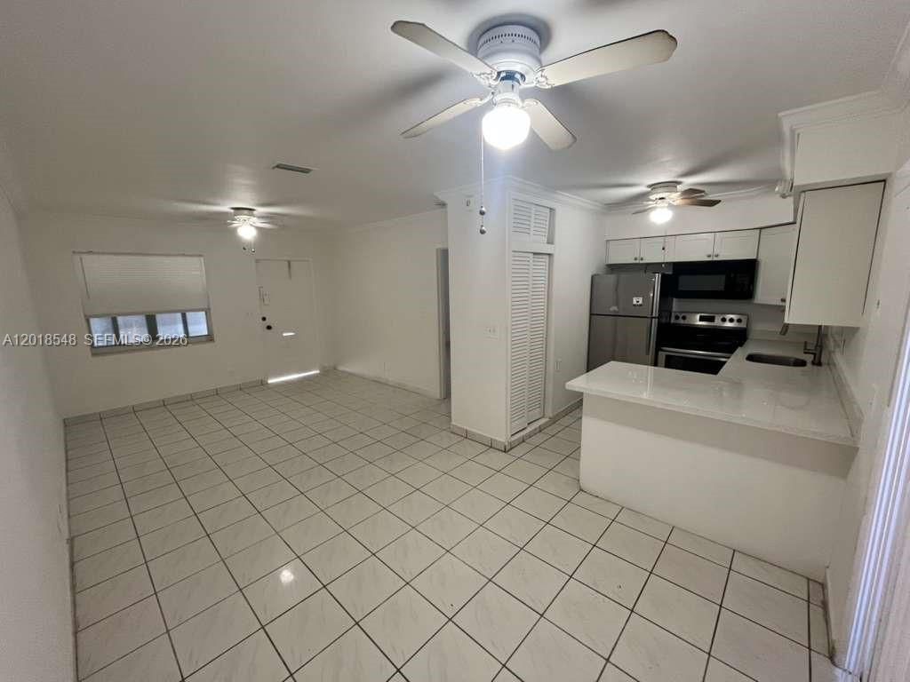 Photo of 2450 Lincoln St #7, Hollywood, FL 33020 (MLS # A12018548)