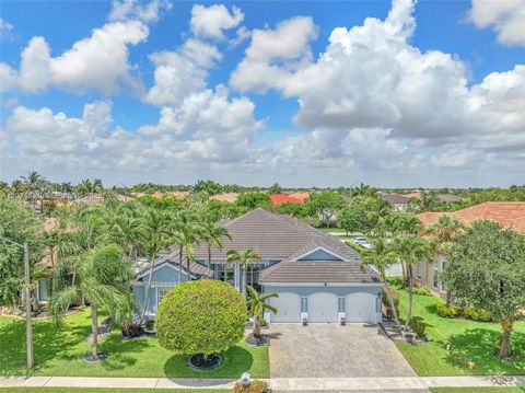 Photo of 1434 SW 159th Ln, Pembroke Pines, FL 33027 (MLS # A12024811)