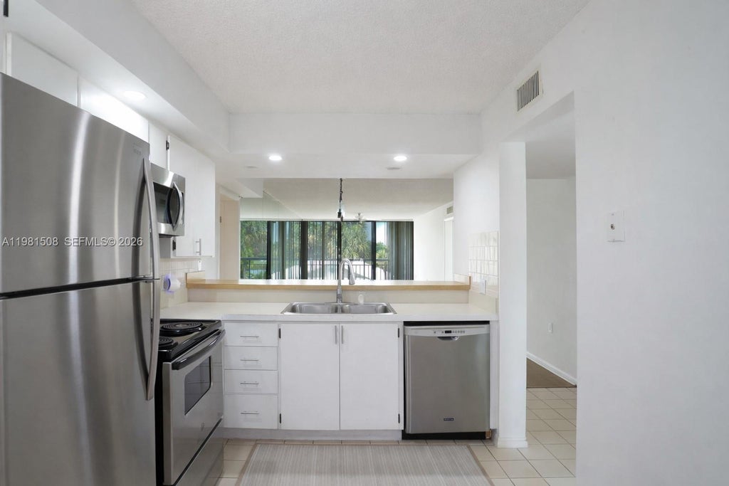 Photo of 2761 Village Blvd #304, West Palm Beach, FL 33409 (MLS # A11981508)