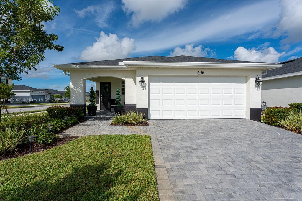 Photo of 6172 NW Sweetwood Dr, Port St Lucie, FL 34987 (MLS # A11882393)
