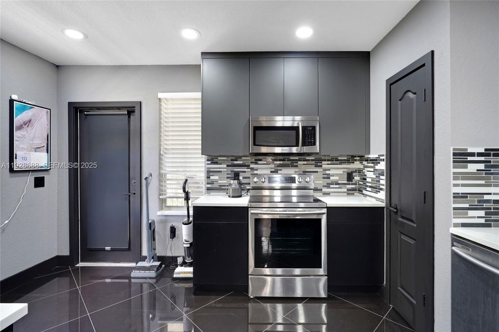 Photo of 1010 Belmont Pl #1010, Boynton Beach, FL 33436 (MLS # A11928688)