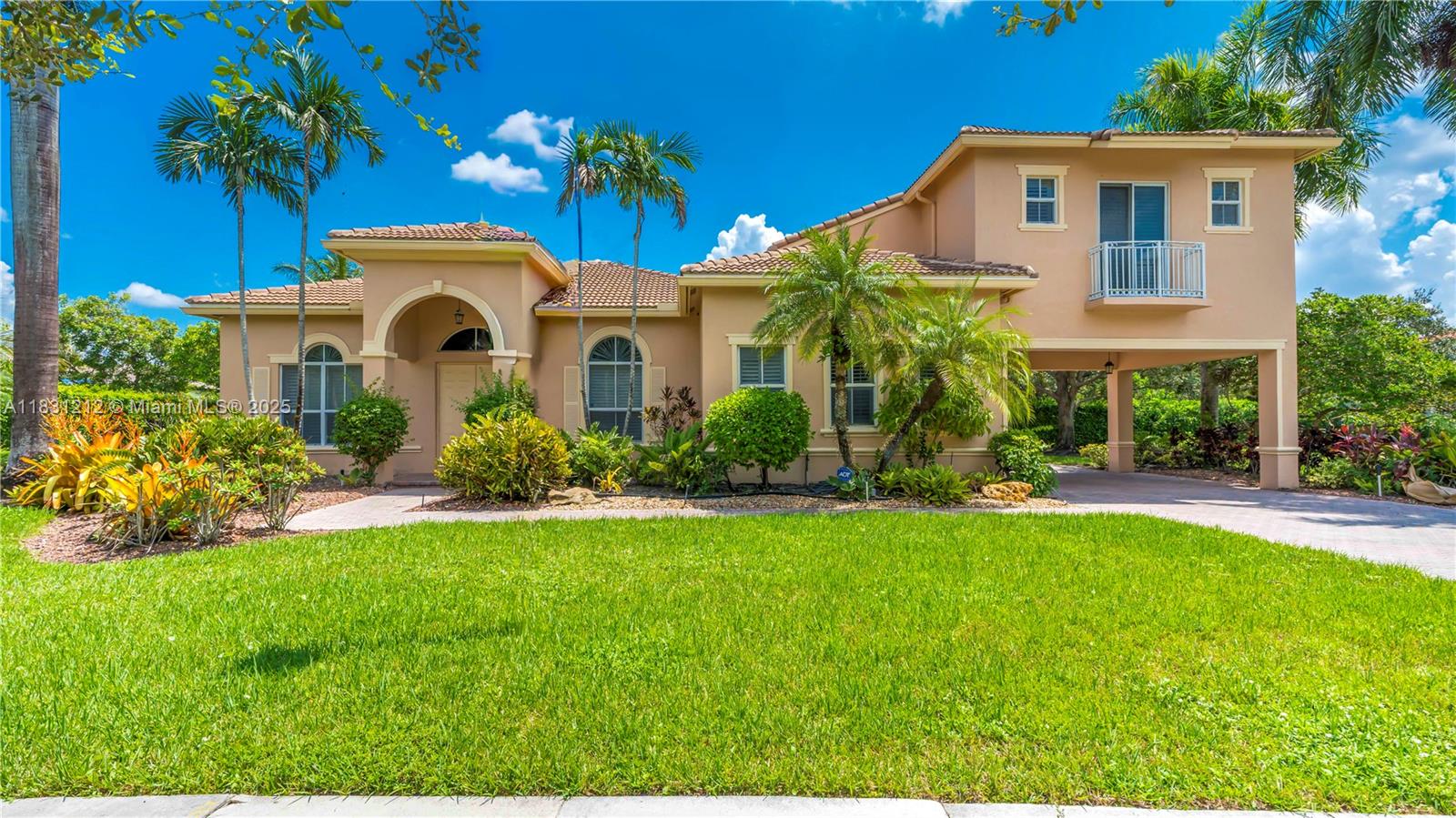 Experience refined luxury in this exquisite estate home with panoramic lake views and lush tropical landscaping surrounding a resort-style pool. Located in the prestigious Saddle Brook community of Davie, this 6-bedroom, 5.5-bath residence offers a 3-car garage, soaring volume ceilings, and marble flooring throughout the main level. The gourmet kitchen features top-tier appliances and a gas cooktop. Additional highlights include a 2021 roof, full-impact windows, whole-house generator, custom walk-in closets, and elegant designer finishes throughout. A true masterpiece of comfort and sophistication.