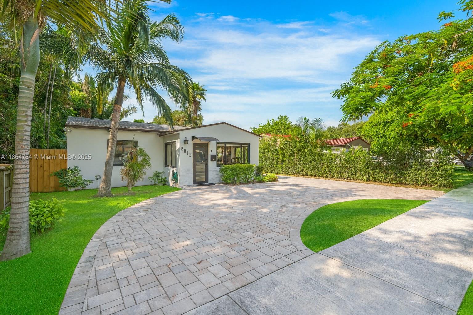 Beautifully renovated 3BR/2BA move-in-ready home in the Heart of Hollywood. Curb appeal features new paver driveway, Newer roof, lush privacy hedges, fresh int & ext. paint 2023,& ES Elite impact door/windows 2023. Inside, enjoy open living w/ elegant 24x48 Turkish-style tile flooring, Remodeled kitchen offers quartz counters, Samsung SS appliances, & touchless-light backsplash. Both baths tastefully updated, w/ major upgrades. New electrical, A/C 2019, newer water heater & ceiling fans. Oversized, fully fenced backyard has no rear neighbors, offering privacy & more than enough room for pool. Relax on the new deck or store gear in the new 10x10 shed. Prime location mins to downtown Hollywood Circle, 10 mins to beach & FLL Airport, close to I-95, Dania Pointe, dining & shopping. A true gem!