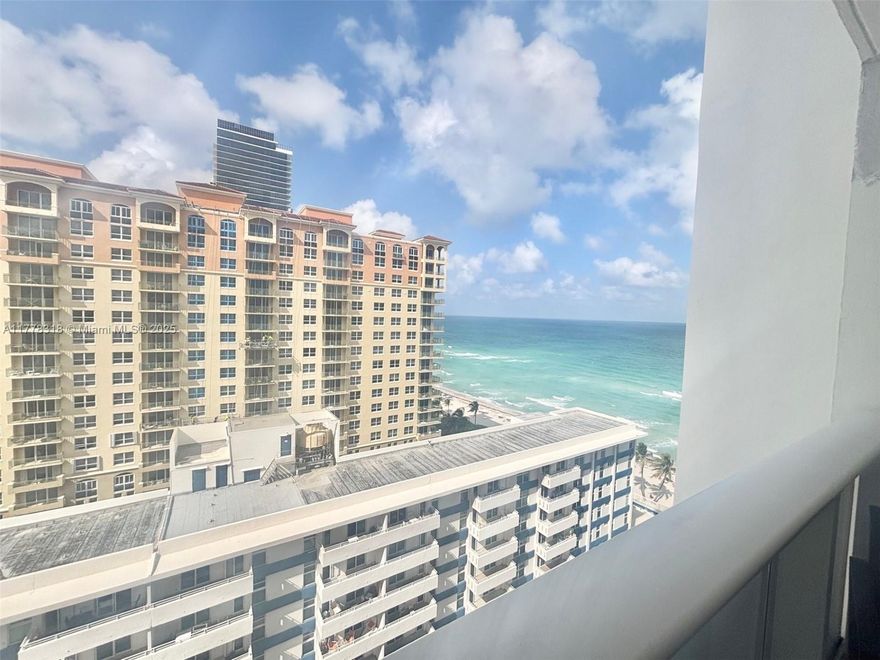 This spacious & beautifully appointed one-bedroom condo offers the perfect blend of comfort & luxury, located directly on the beach with great views. The home features tiled floors throughout, adding a modern touch to the bright & open living spaces. Enjoy the convenience of a full bedroom & an additional half bath for guests. The white kitchen, complete with sleek stainless steel appliances, provides a stylish & functional space for cooking & entertaining. Impact windows ensure peace of mind. The resort-style building offers incredible amenities, such as an oceanfront pool for relaxing, a fully equipped exercise room, & a game room for endless entertainment. Low maintenance fees covering essential services like gas, A/C, Wi-Fi, cable, & hot water, offers the ultimate in carefree living!