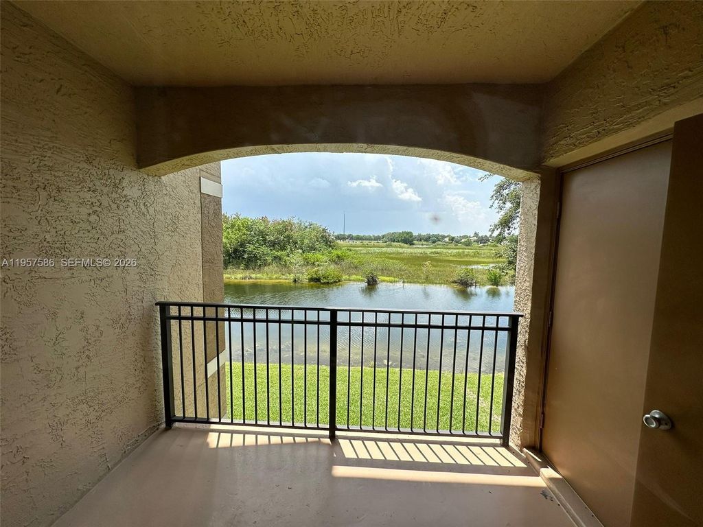 Photo of 11600 SW 2nd St #18208, Pembroke Pines, FL 33025 (MLS # A11957586)
