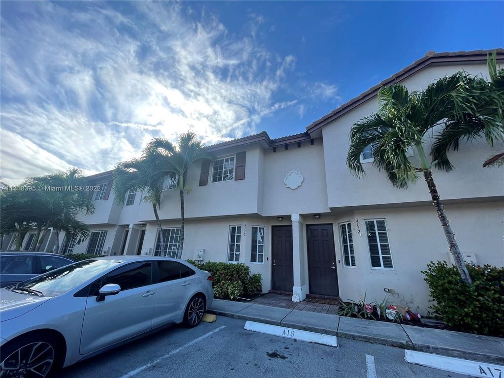 Photo of 4130 Napoli Lake Dr #4130, Riviera Beach, FL 33410 (MLS # A11318395)