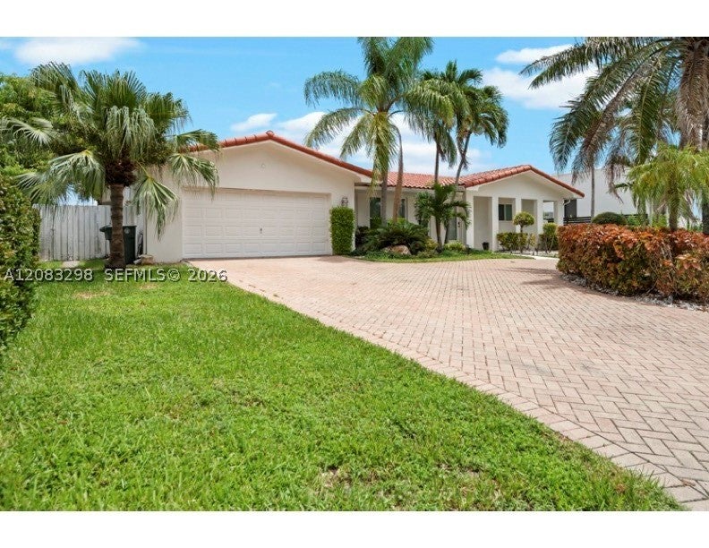 Photo of 649 Layne Blvd, Hallandale Beach, FL 33009 (MLS # A12083298)