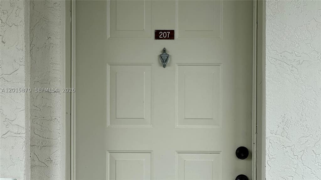 Photo of 2236 N Cypress Bend Dr #207, Pompano Beach, FL 33069 (MLS # A12015870)