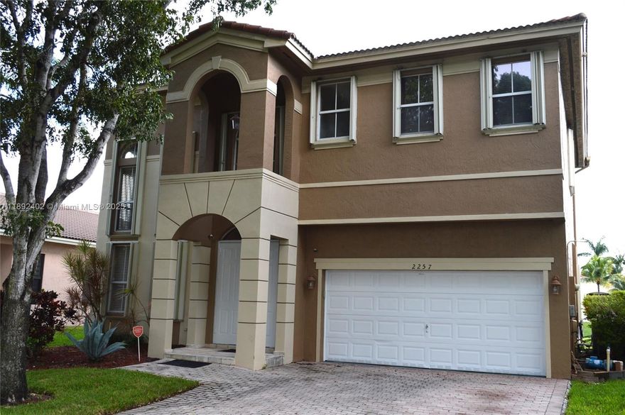 WELCOME TO THIS STUNNING 2 STORY LAKE FRONT HOME  2257 SW 132 AVE LOCATED IN THE GATED COMMUNITY OF PALM COVE 
A SUBDIVISION OF  MONARCH LAKES IN MIRAMAR FEATURES OPEN FLOORPLAN WITH HIGH CEILINGS
ISLAND KITCHEN W GRANITE COUNTERTOP , WOOD CABINETS AND SS APPLIANCES 4 BEDROOMS ON 2 FLOOR. 2 FULL BATH W SEPARATE SHOWER AND JACUZZI BATH TUB IN MAIN BATHROOM.
 
EACH FLOOR HAS OWN 3 TON AC WHICH WERE RECENTLY REPLACED W BRAND AC INSTALLED  OCT 2024 AND JUNE 2025   
RECENTLY INSTALLED 2 BRAND NEW 3 TON AC.
RECREATIONAL CENTER  FEAUTURES BASKETBALL AND TENNIS COURTS, CHILDRENS PLAYGROUND. SORRY NO POOL 
LOW HOA FEE