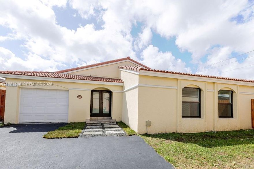 Fully renovated 3 bedroom, 2 bathroom home with 1-car garage located in the gated Royal Poinciana community. This property sits on one of the larger lots in the neighborhood at approximately 6,000 sq ft, while most homes in the area are closer to 4,000 sq ft. The oversized lot allows space for boat or additional vehicle access on the side of the property, which is rare in this community.

The home has been completely updated with a modern open layout featuring a new kitchen with shaker cabinets, quartz countertops, stainless steel appliances, and a large island. Both bathrooms have been fully remodeled with contemporary finishes. Large porcelain tile flooring and high ceilings create a bright and spacious feel throughout the home.

A major highlight is the large covered patio that is part of the original structure of the home rather than an added enclosure, providing a true indoor-outdoor living space that many homes in the community do not offer.

Additional features include impact front windows and door, accordion shutters protecting the rear of the home, and a newer AC system installed in 2023.

Located in a gated community near major highways, shopping, and restaurants.