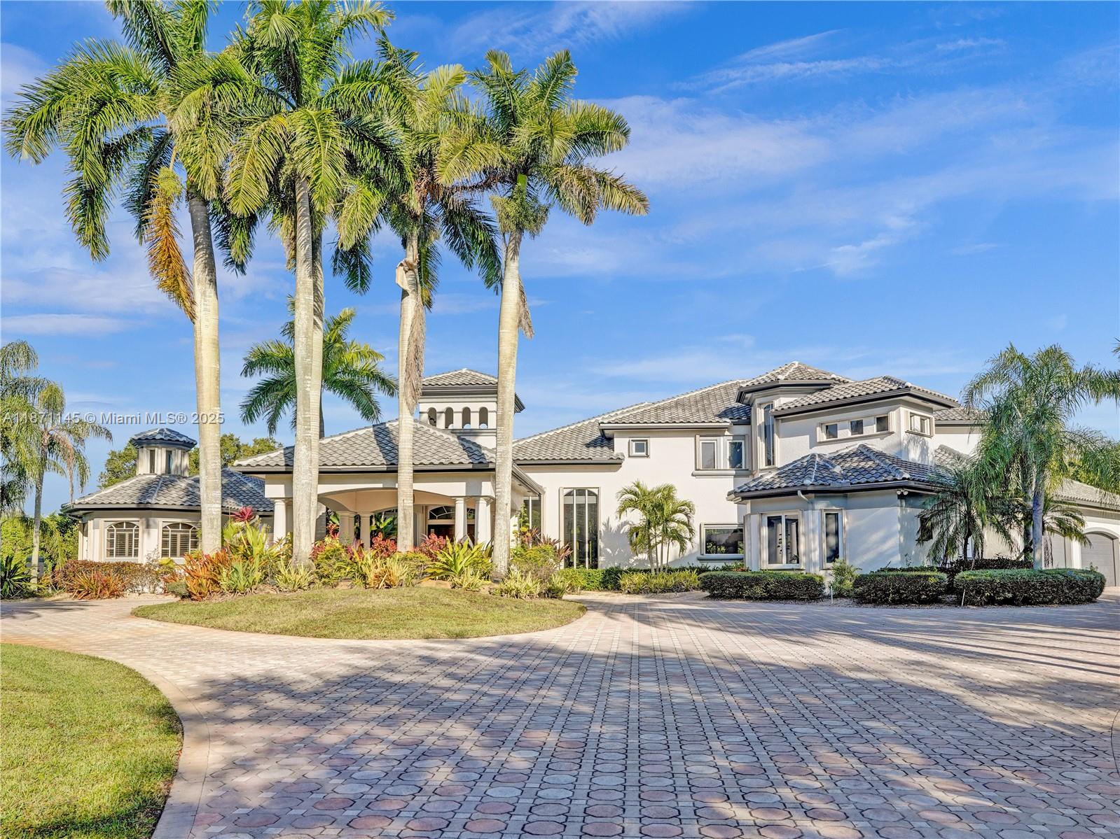 Presenting a truly exceptional, one-of-a-kind residence in the prestigious Windmill Ranch Estates. Situated on a sprawling 1.53-acre cul-de-sac lot with a tennis court, this magnificent estate offers the utmost in luxury & privacy. 6 Bedrooms (all ensuite) with master suite on the first floor, 6 1/2 baths plus office/den, exercise rm, & a spacious loft. Impeccable attention to detail with soaring ceilings & an open layout that creates an ideal space for both relaxation & entertaining. Stunning kitchen with top-of-the-line appliances & large center island, formal dining rm with a butler’s pantry, living rm with fireplace & breathtaking views of the backyard, expansive patio areas & pool with spa. Grand circular driveway, with porte-cochere & a 4-car garage. New Roof!