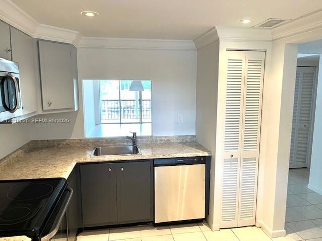 Photo of 3920 Inverrary Blvd #204C, Lauderhill, FL 33319 (MLS # A12010525)