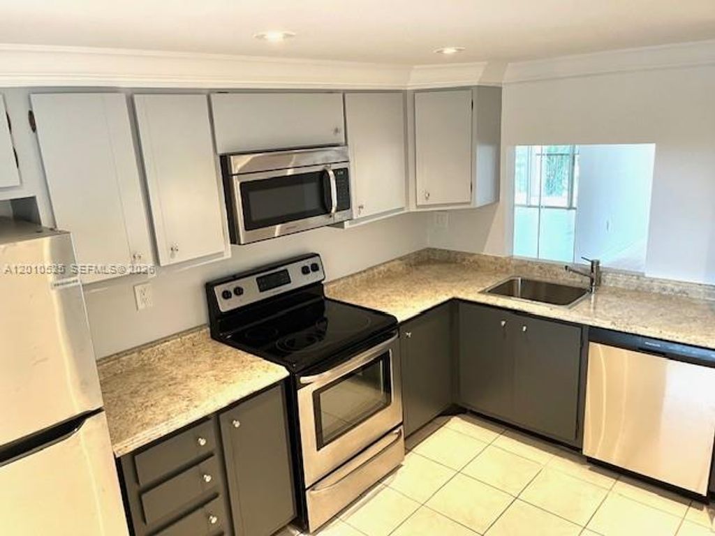 Photo of 3920 Inverrary Blvd #204C, Lauderhill, FL 33319 (MLS # A12010525)